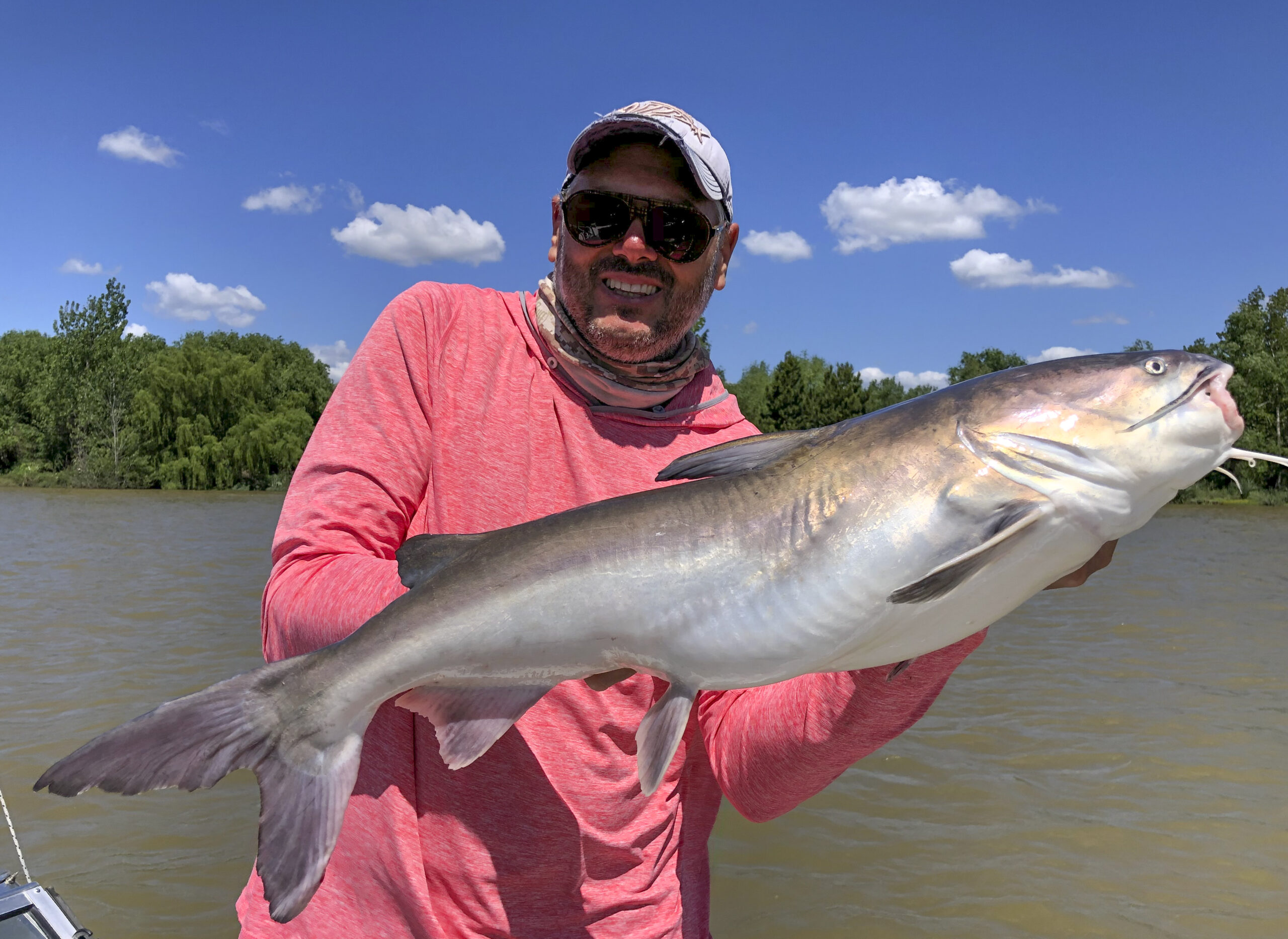 Lucas with a 10 pounder Sea Catfish. a chrome catfish from the sea